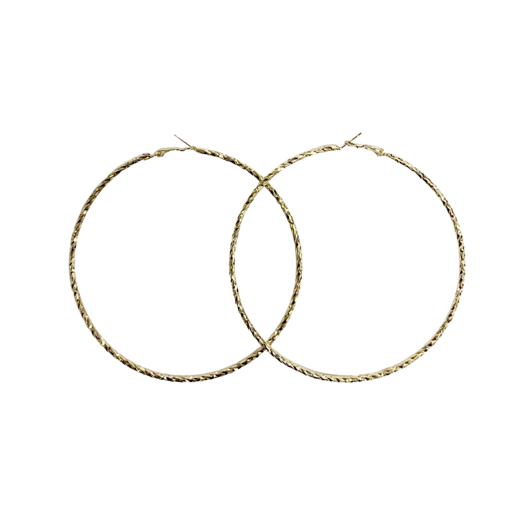 Large gold hooped earring